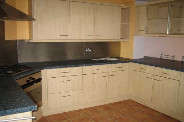 This shows a close up of the kitchen units and the ceramic flooring that we put down for these clients in the kitchen area